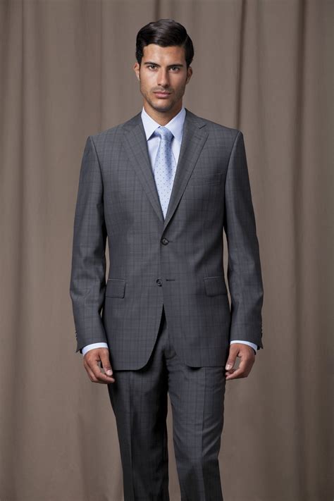 charcoal grey suit blue shirt.